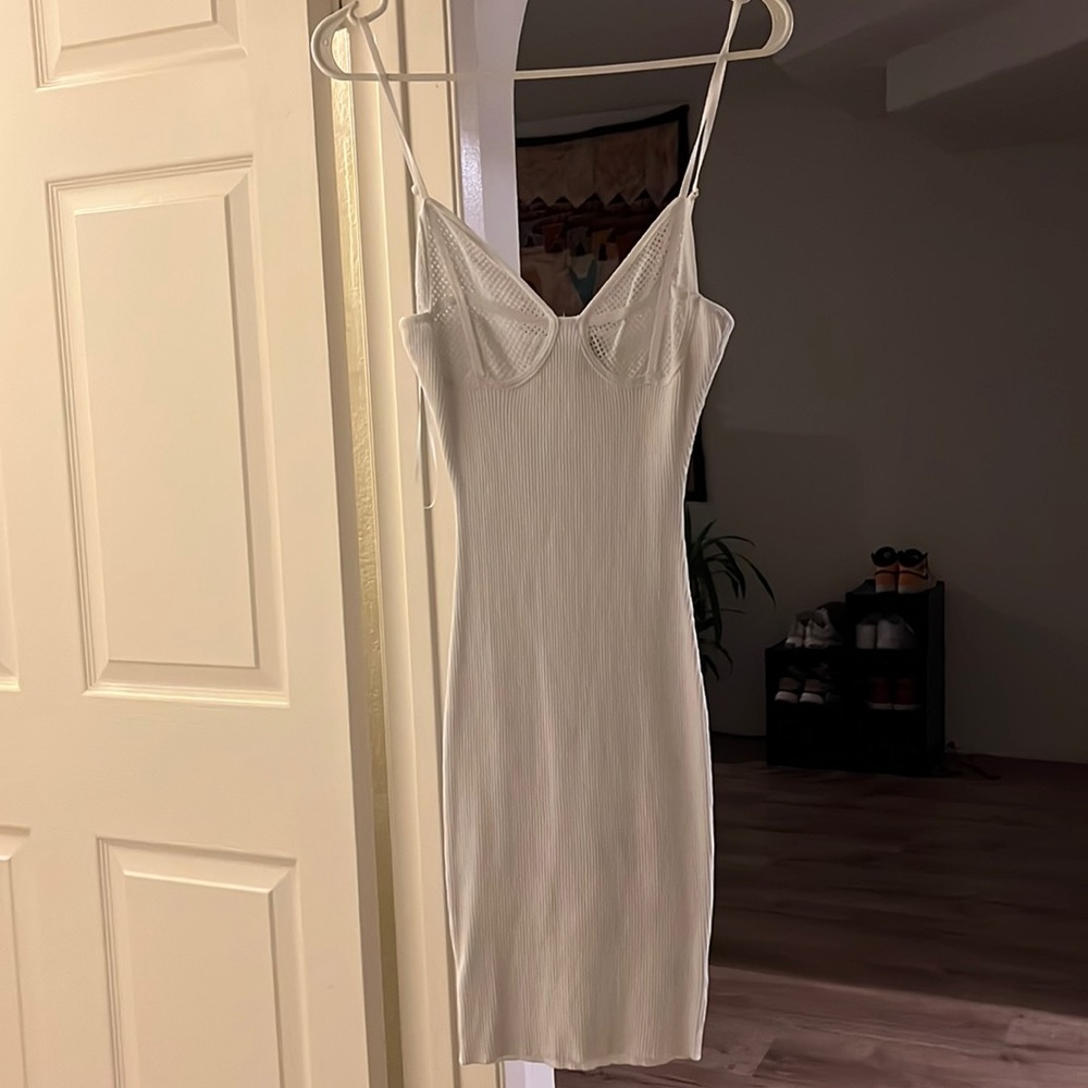 White dress. Very comfortable.Size Large but I wear a medium and it fits perfect